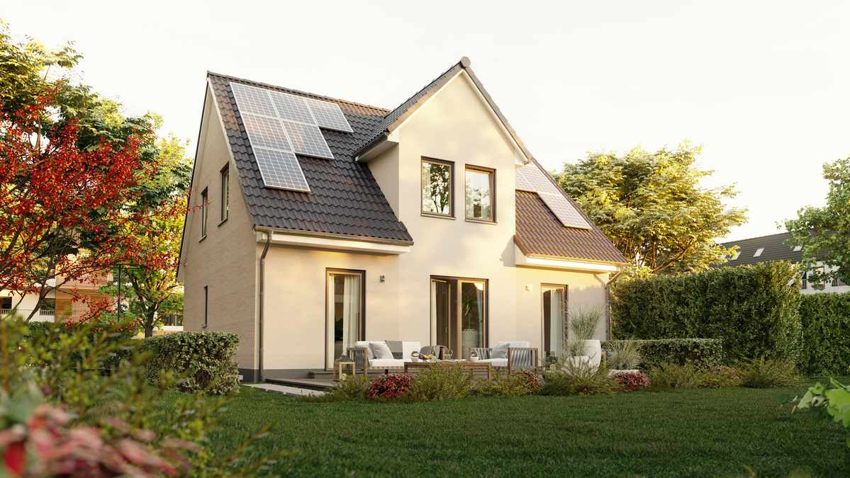 Blick vom Garten auf Flair 134 mit einer umweltfreundlichen PV-Anlage für nachhaltiges Wohnen.